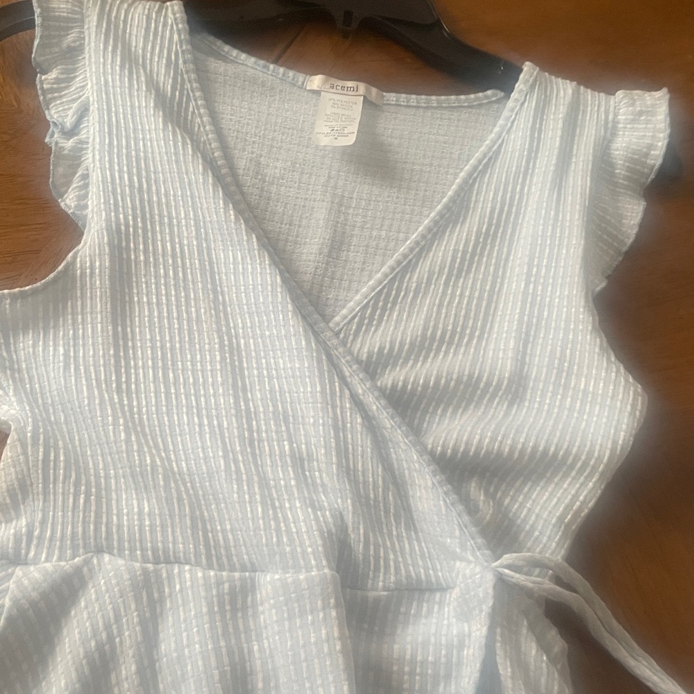 Peplum style Sleeveless shirt